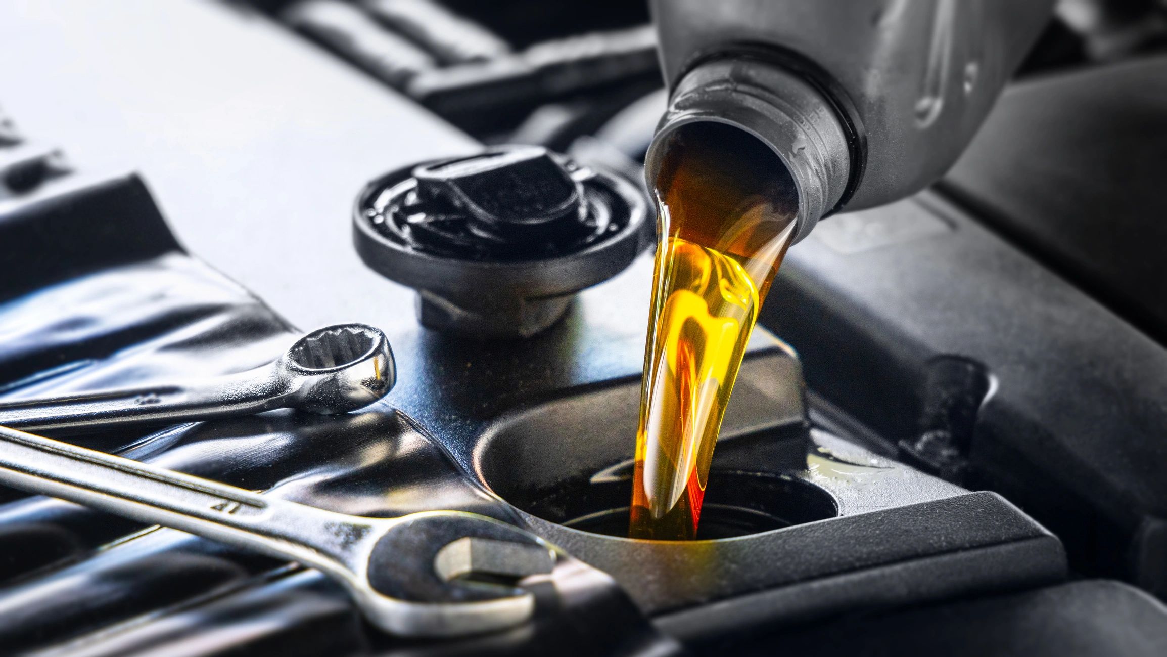 Close-up of routine automotive service work